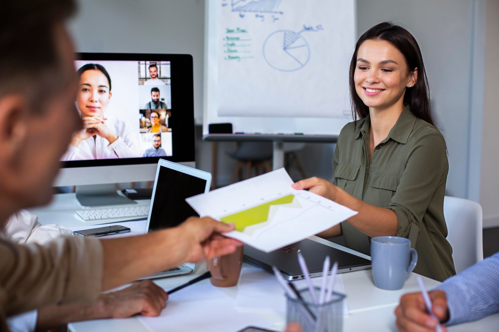 people-using-digital-device-while-meeting